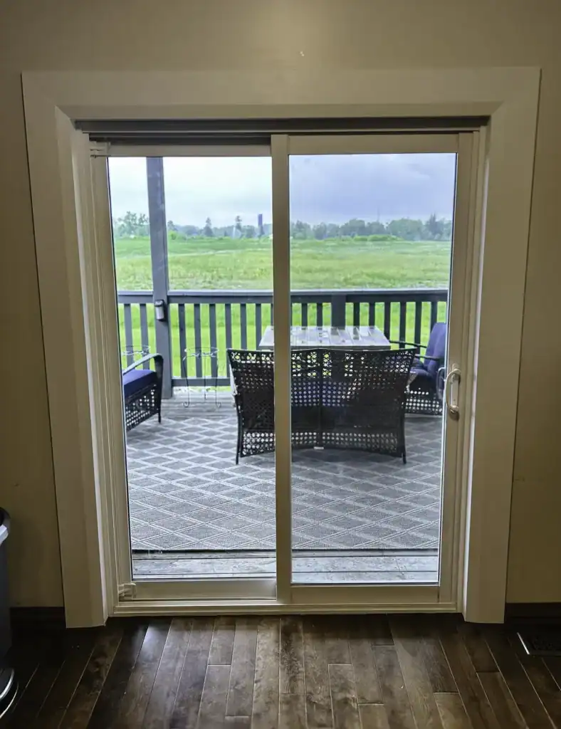 Finished interior view of the back slider door install and door trim