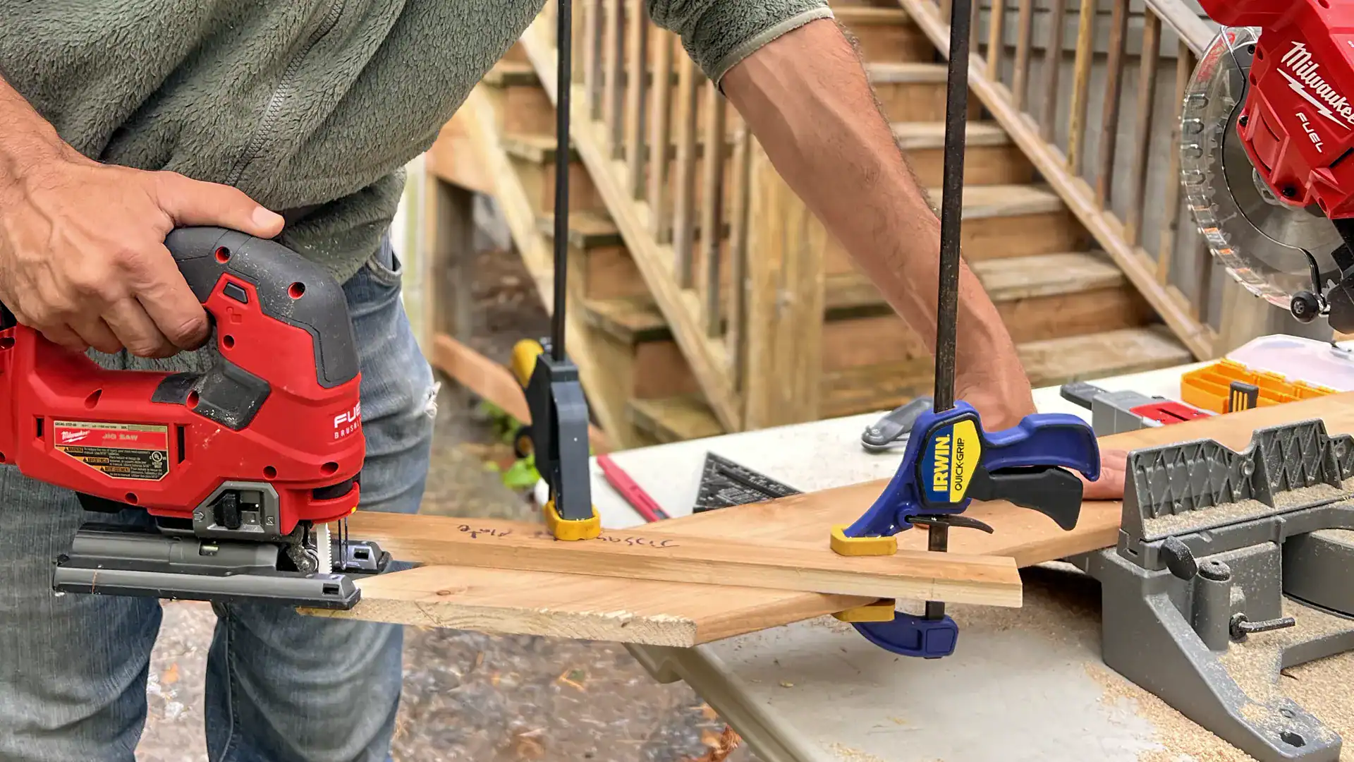 Contractor building a small tool shed door